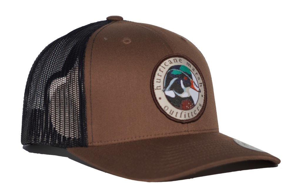 
                  
                    The Woodie Cayote Brown/Black Hat
                  
                
